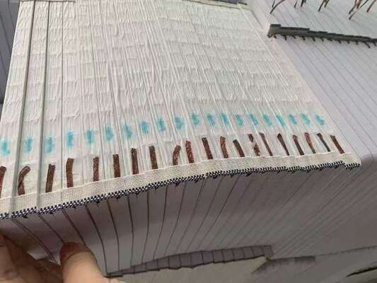 Machine à bande de tête de bloc de livre semi-automatique 220V 1.5KW pour la bande de tête de livre à couverture dure avec 11 pièces/minute