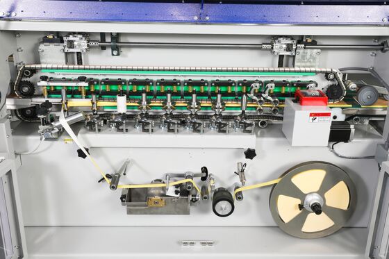 Machine d'emballage de papier arrière